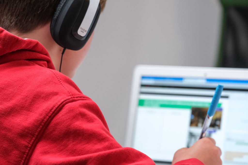 boy studying on computer
